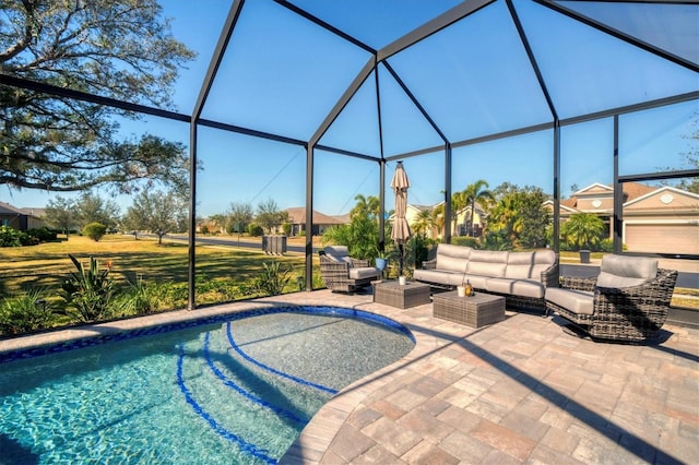 view of pool featuring an outdoor living space, a lanai, and a patio area