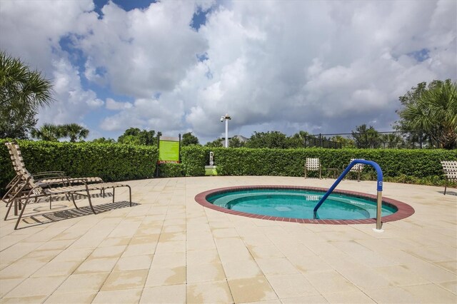 2006 Red Lake Run, Bradenton, FL 34211 - view of pool featuring a community hot tub and a patio