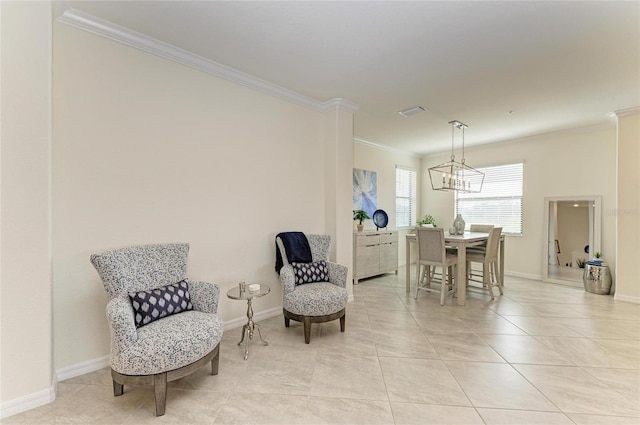 living area featuring crown molding, light tile patterned flooring, and a notable chandelier