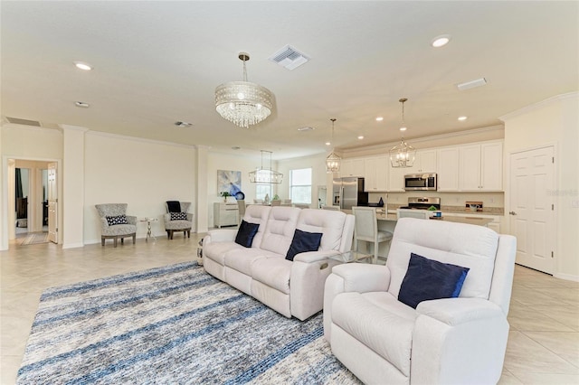 tiled living room with a notable chandelier and crown molding