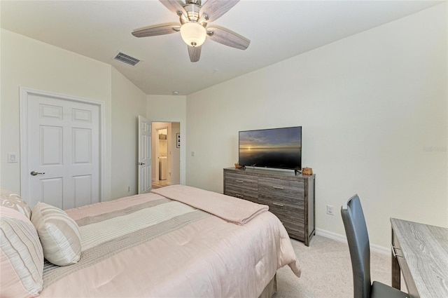 bedroom featuring light colored carpet and ceiling fan