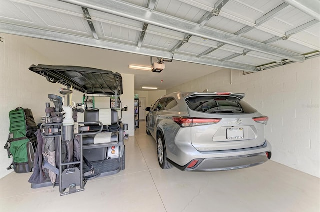 garage featuring a garage door opener