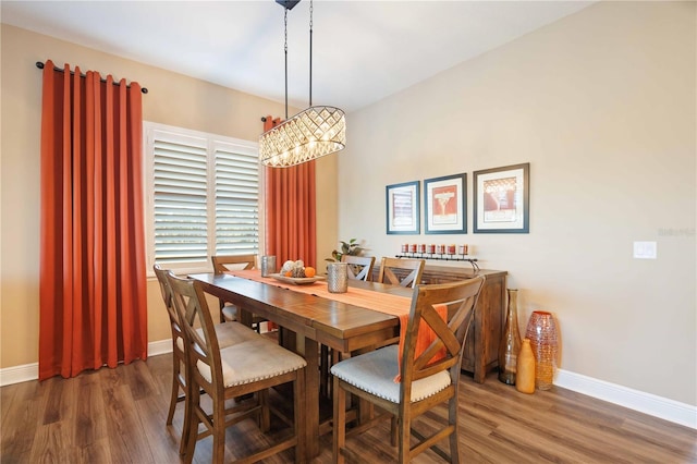 dining area featuring dark hardwood / wood-style flooring