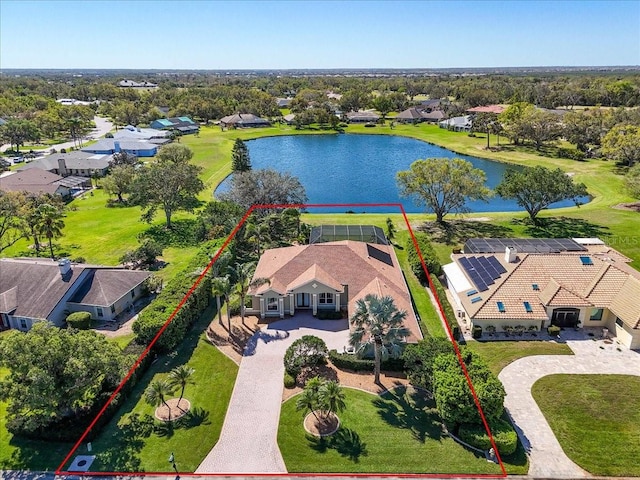 birds eye view of property featuring a residential view and a water view