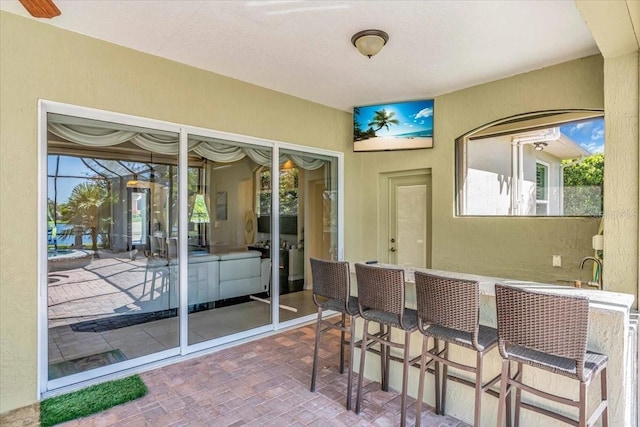 view of patio / terrace with outdoor dry bar