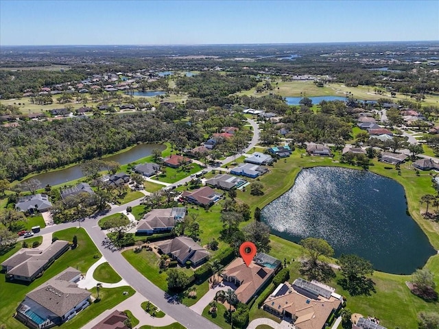 aerial view featuring a water view and a residential view