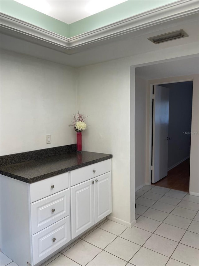 hallway with light tile patterned flooring