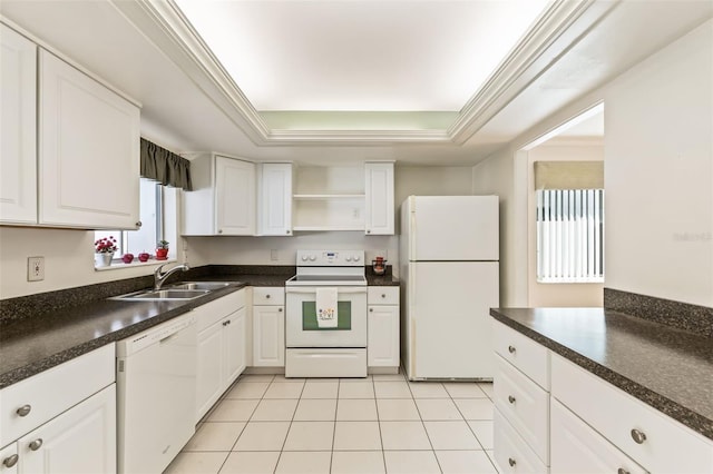 kitchen featuring a tray ceiling, sink, white appliances, and white cabinets