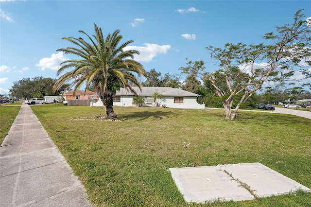 view of front facade with a front lawn