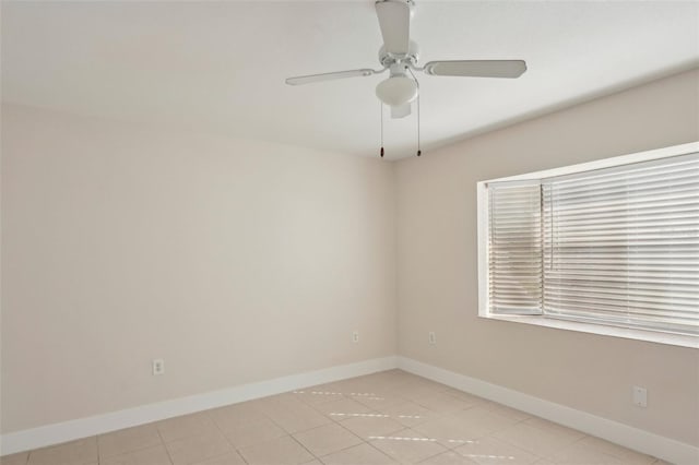 spare room featuring ceiling fan