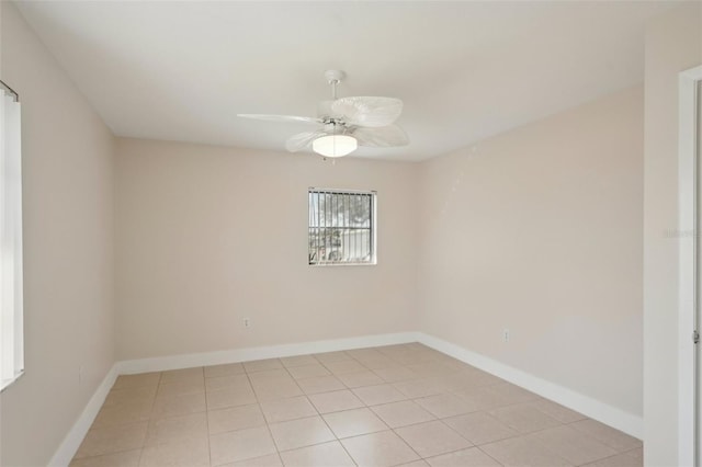 spare room with ceiling fan