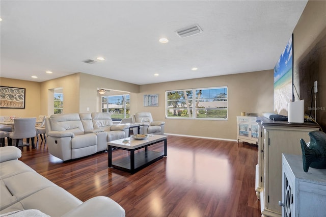 living room with dark wood-type flooring