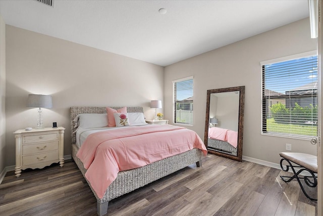 bedroom featuring hardwood / wood-style flooring