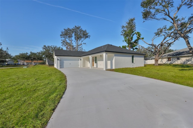 view of front facade with a garage and a front yard