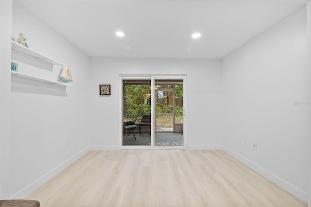 unfurnished room featuring light wood-type flooring