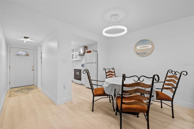 dining area featuring light hardwood / wood-style floors