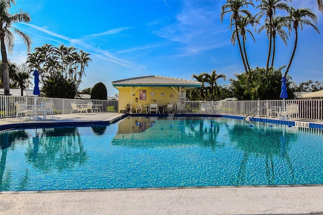 view of swimming pool with a patio area