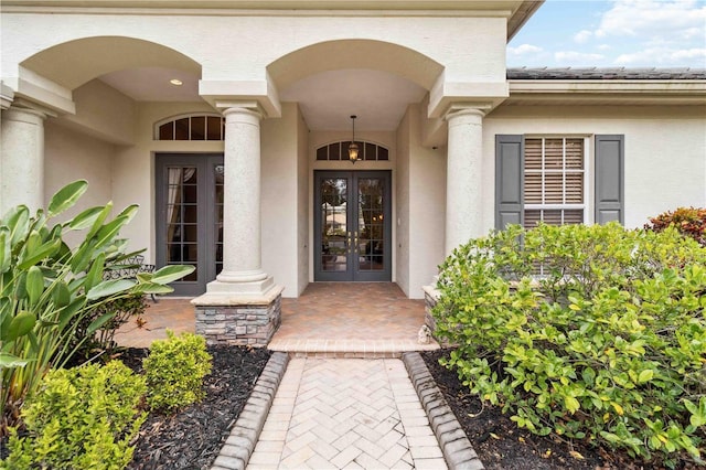 property entrance featuring french doors