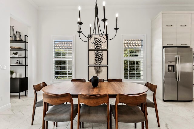 dining room with an inviting chandelier and ornamental molding