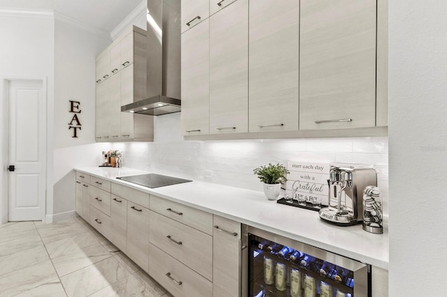 kitchen with wine cooler, wall chimney exhaust hood, crown molding, black electric stovetop, and decorative backsplash