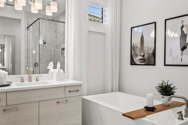 bathroom featuring independent shower and bath and vanity