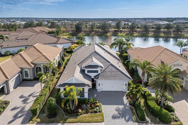 drone / aerial view with a water view