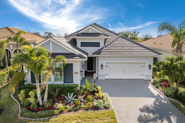 view of front of property featuring a garage