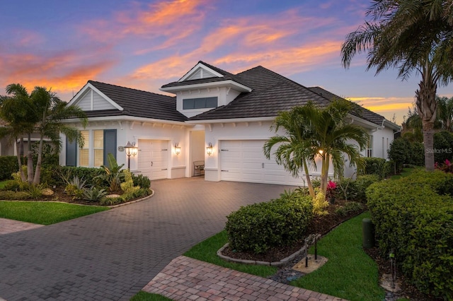 view of front of property with a garage