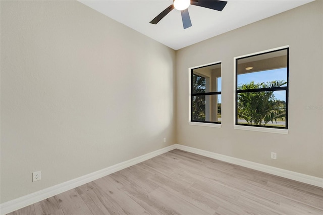 spare room featuring ceiling fan and light hardwood / wood-style floors