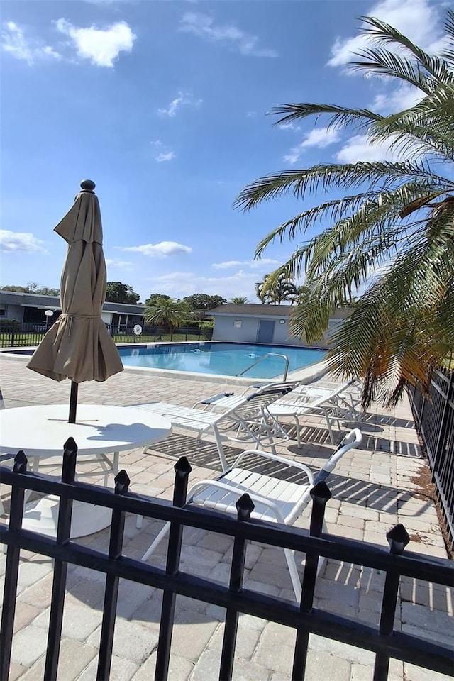 view of pool featuring a patio area