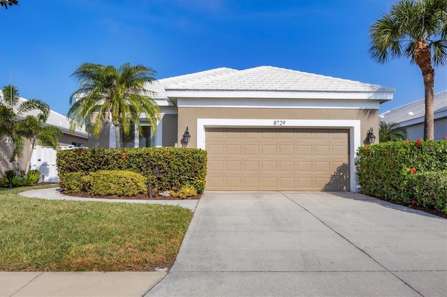 view of front of property with a garage