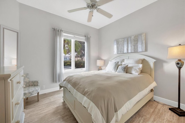 bedroom featuring ceiling fan and light hardwood / wood-style floors