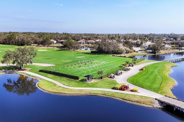 surrounding community featuring a water view