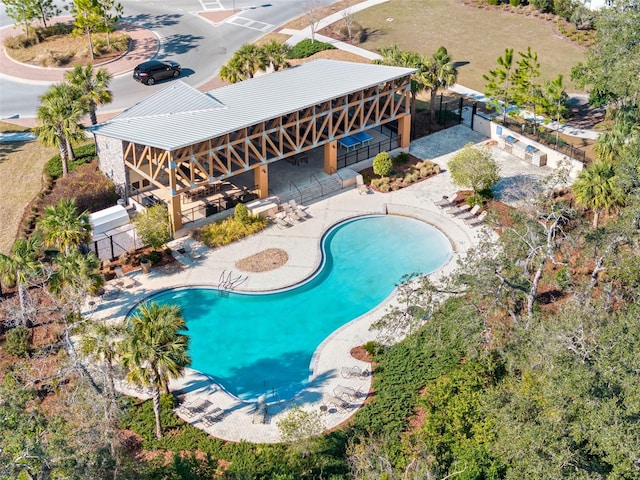 view of swimming pool featuring a patio area