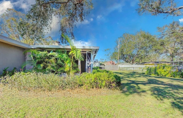 view of yard with fence