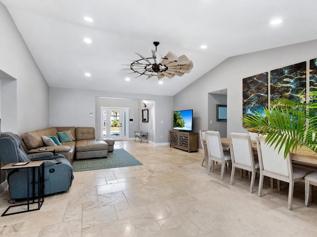living room featuring lofted ceiling