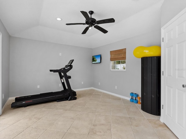 workout area with light tile patterned flooring, lofted ceiling, and ceiling fan