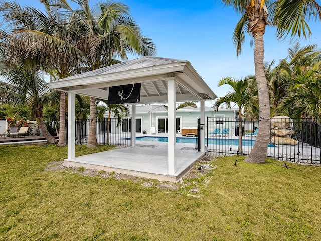 view of swimming pool with a patio, a gazebo, and a lawn