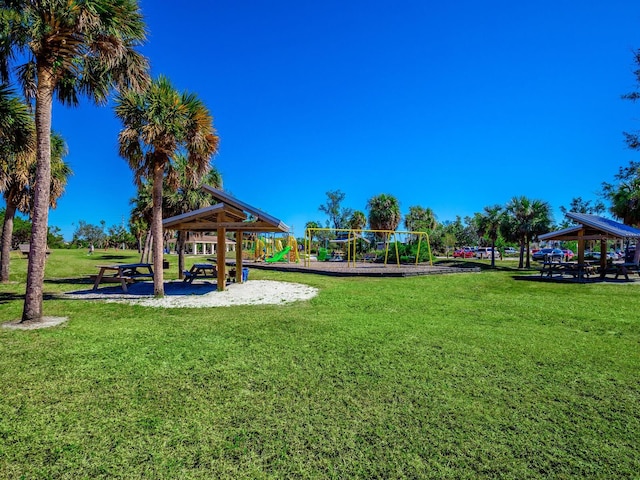 surrounding community with a yard, a playground, and a gazebo