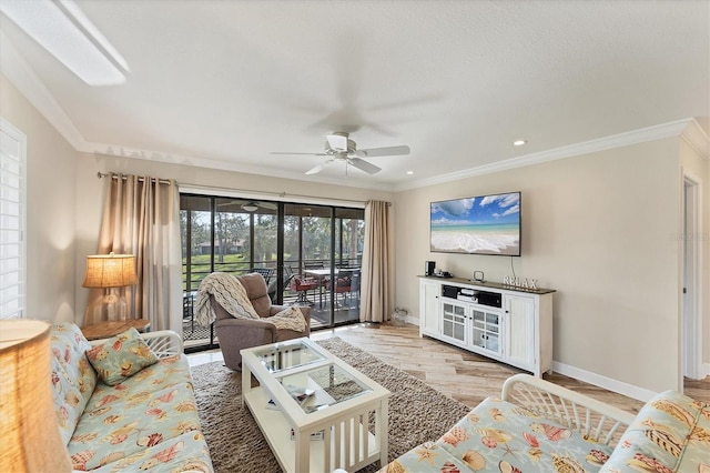 living room with light hardwood / wood-style flooring, ornamental molding, and ceiling fan