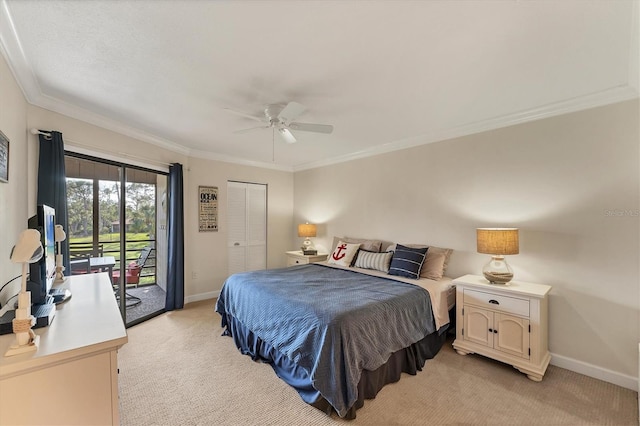 carpeted bedroom featuring crown molding, access to outside, a closet, and ceiling fan