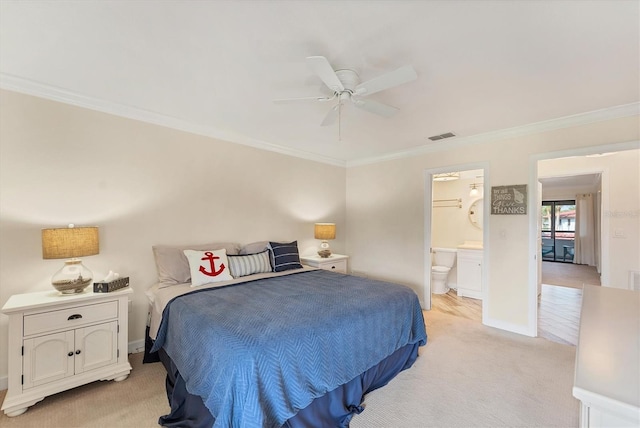 carpeted bedroom featuring ornamental molding, connected bathroom, and ceiling fan