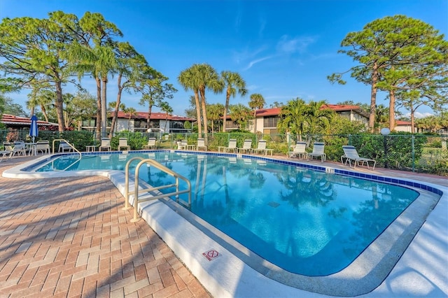 view of swimming pool featuring a patio