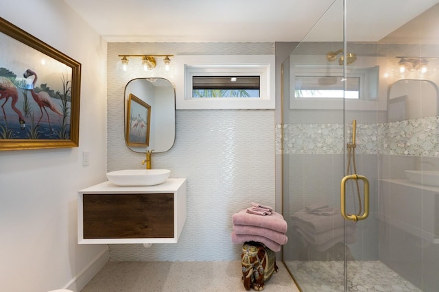 bathroom with vanity and an enclosed shower