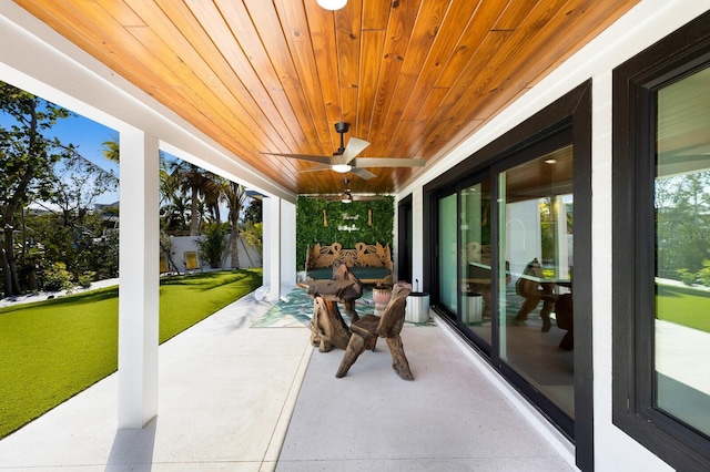 sunroom with wood ceiling