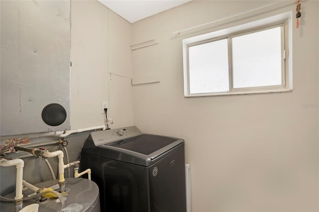 2211 Sunset Dr Unit E3, Bradenton, FL 34207 - laundry area featuring washer / clothes dryer and water heater