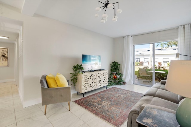 2211 Sunset Dr Unit E3, Bradenton, FL 34207 - tiled living room featuring a notable chandelier