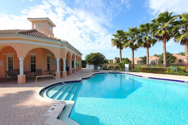 view of pool featuring a patio