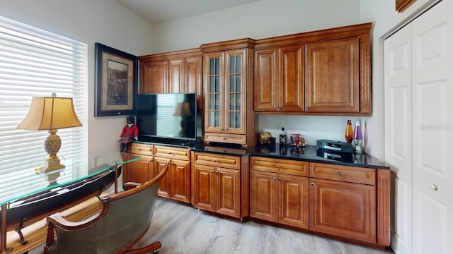 kitchen featuring a healthy amount of sunlight and light hardwood / wood-style floors