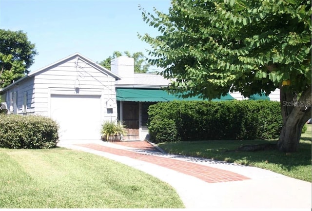 view of front of home with a front yard